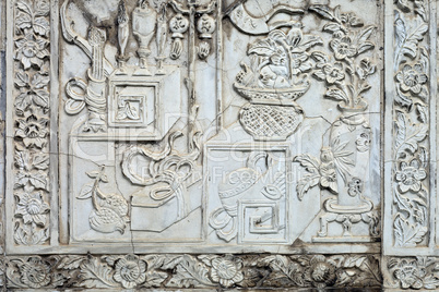 White stucco , thai style on the Wall