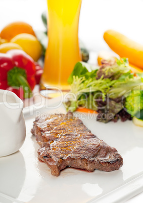 juicy BBQ grilled rib eye ,ribeye steak and vegetables