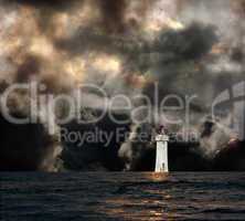 White lighthouse with dramatic storm clouds