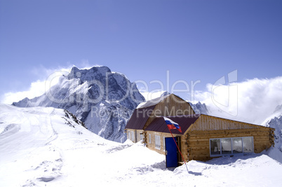 Wooden houses in high mountains. Ski resort