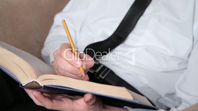 young man prepares for study.