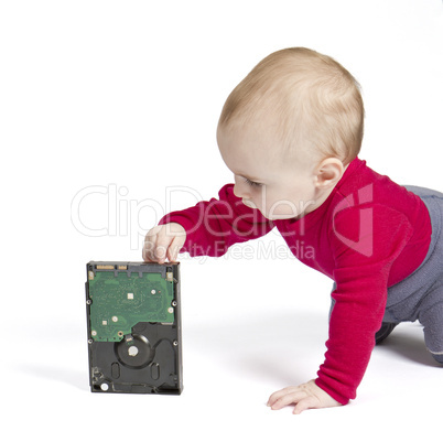 young child in white background with hard drive