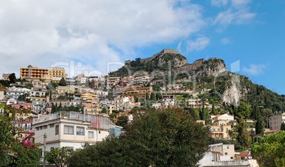 Monte Tauro with Saracen Castle and Santuario Madonna della Rocca above Taormina in Sicily,Italy
