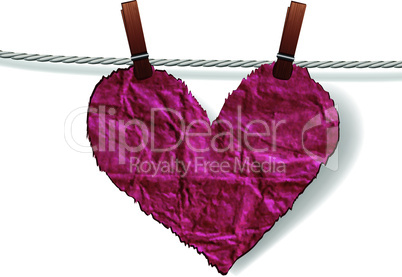 Heart crumpled ragged attached to a clothesline with pin