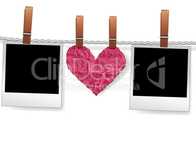 Photo frames and heart on rope