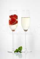 Two glasses of sparkling wine and strawberry