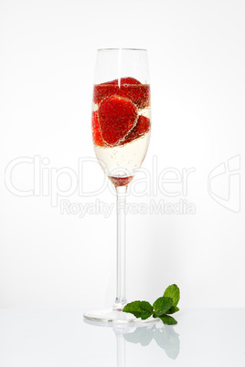 Glasses of sparkling wine and strawberry