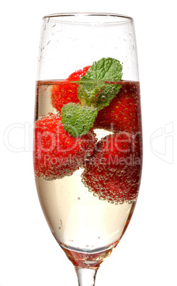Glasses of sparkling wine and strawberry