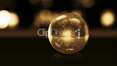 golden glass ball with snow