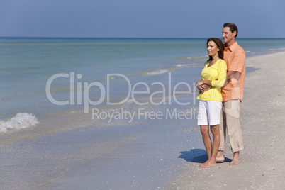 Happy, Man and Woman Couple Embracing on An Empty Beach