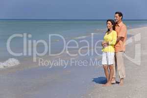 Happy, Man and Woman Couple Embracing on An Empty Beach