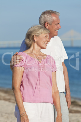 Happy Romantic Senior Couple Embracing on Beach