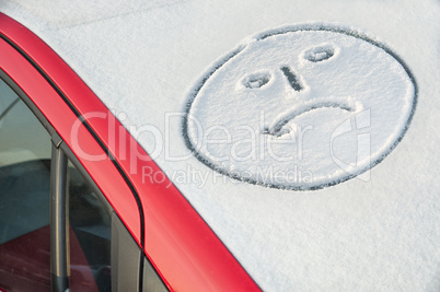 weinendes Smiley auf Schnee