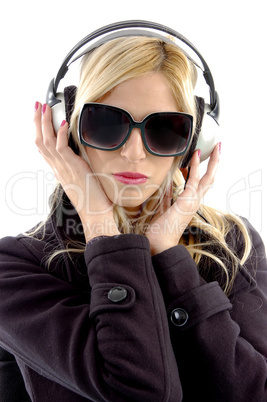 front view of woman listening music