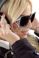 close view of woman holding headphone