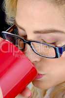 close view of woman drinking coffee