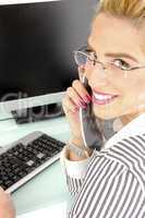 half length view of woman busy on phone