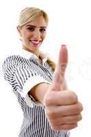 side pose of smiling woman with thumbs up
