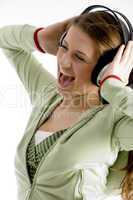 woman shouting while listening music