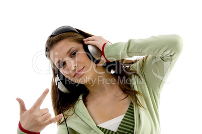 beautiful fashion girl enjoying music