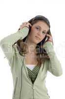 pretty young woman listening to music