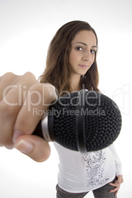 young female holding microphone