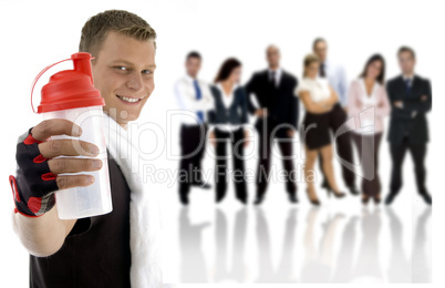 young guy showing sipper bottle and his team standing on his back