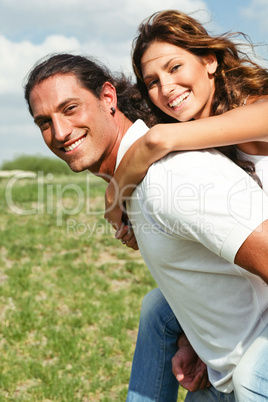 Female enjoying piggy ride