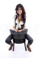 female in casuals sitting on chair
