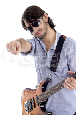 young guitarist with pointing finger