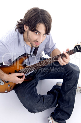 young guy playing melody