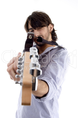 handsome man pointing at you with guitar