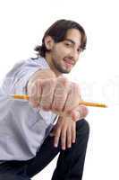 handsome cool man showing pencil