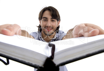 smart guy holding his opened diary