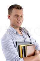 portrait of student holding books