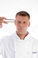 chef looking chopsticks