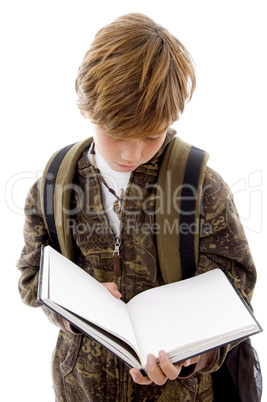 front view of schoolchild reading