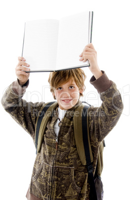 school boy at camera showing copy space