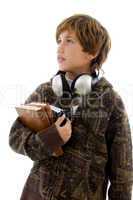 side view of boy with books and headphone