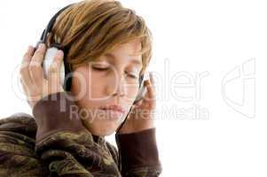 portrait of teen listening music