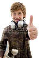 front view of boy with headphone and thumbs up