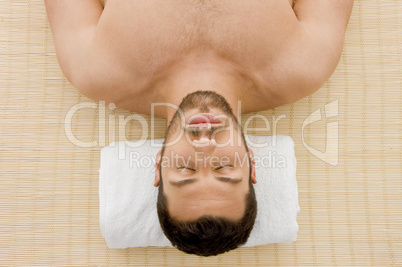 high angle view of relaxing male at spa