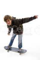 front view of boy riding skateboard