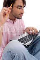 young man working on laptop