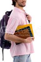 young man holding bag and books
