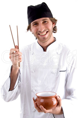 happy chef holding bowl and chopsticks