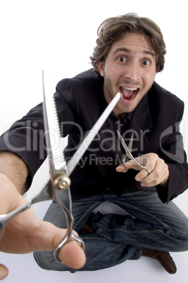 young barber with scissors