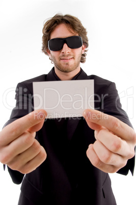 young male holding business card