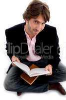 handsome sitting male with books
