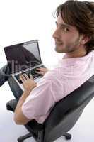 side view of man with laptop